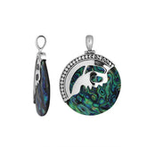 Handcrafted sterling silver round pendant with vibrant abalone shell inlay and unique silver overlay, artisan Bali jewelry with ocean-inspired shimmer.
